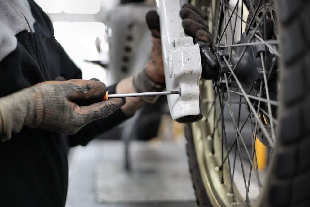 changing a tire tube on a motorcycle